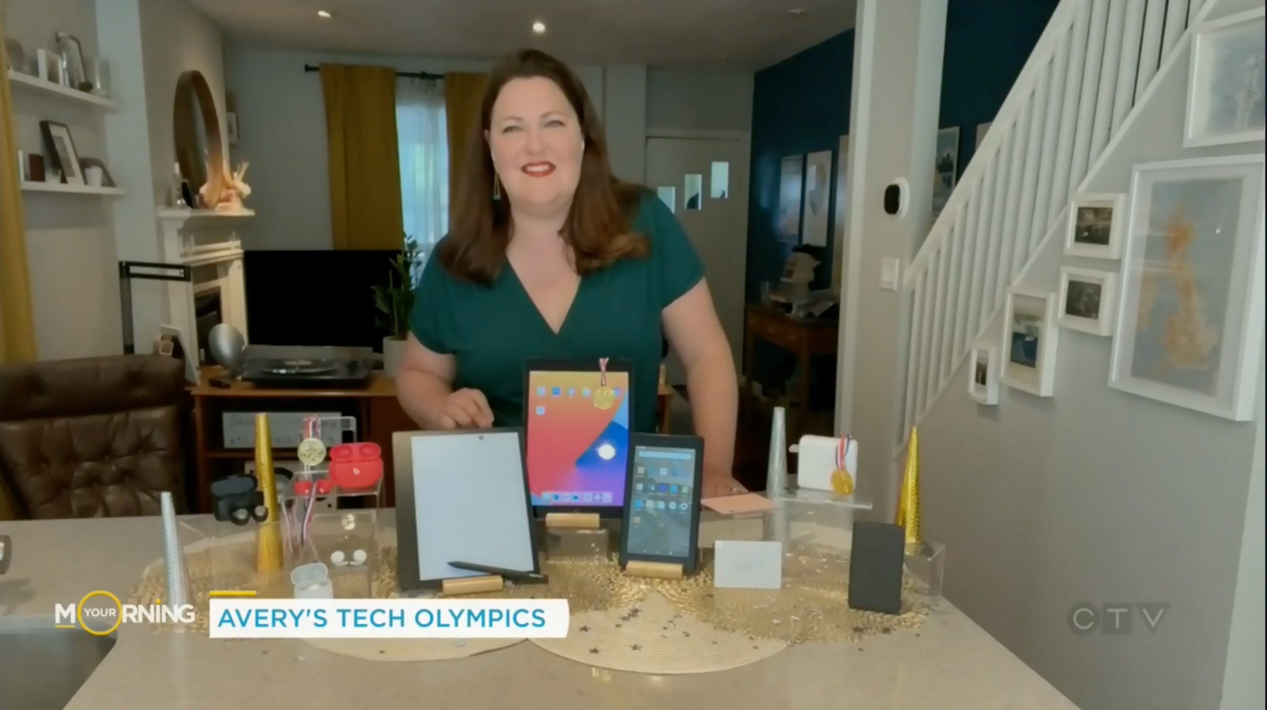 Avery Swartz demonstrating earbuds, tablets, and portable power on CTV Your Morning